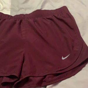 Red/Maroon Nike running Shorts. Adjustable Waist. Size S